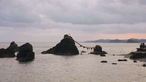 sunrise at meoto iwa on overcast day in mie japan