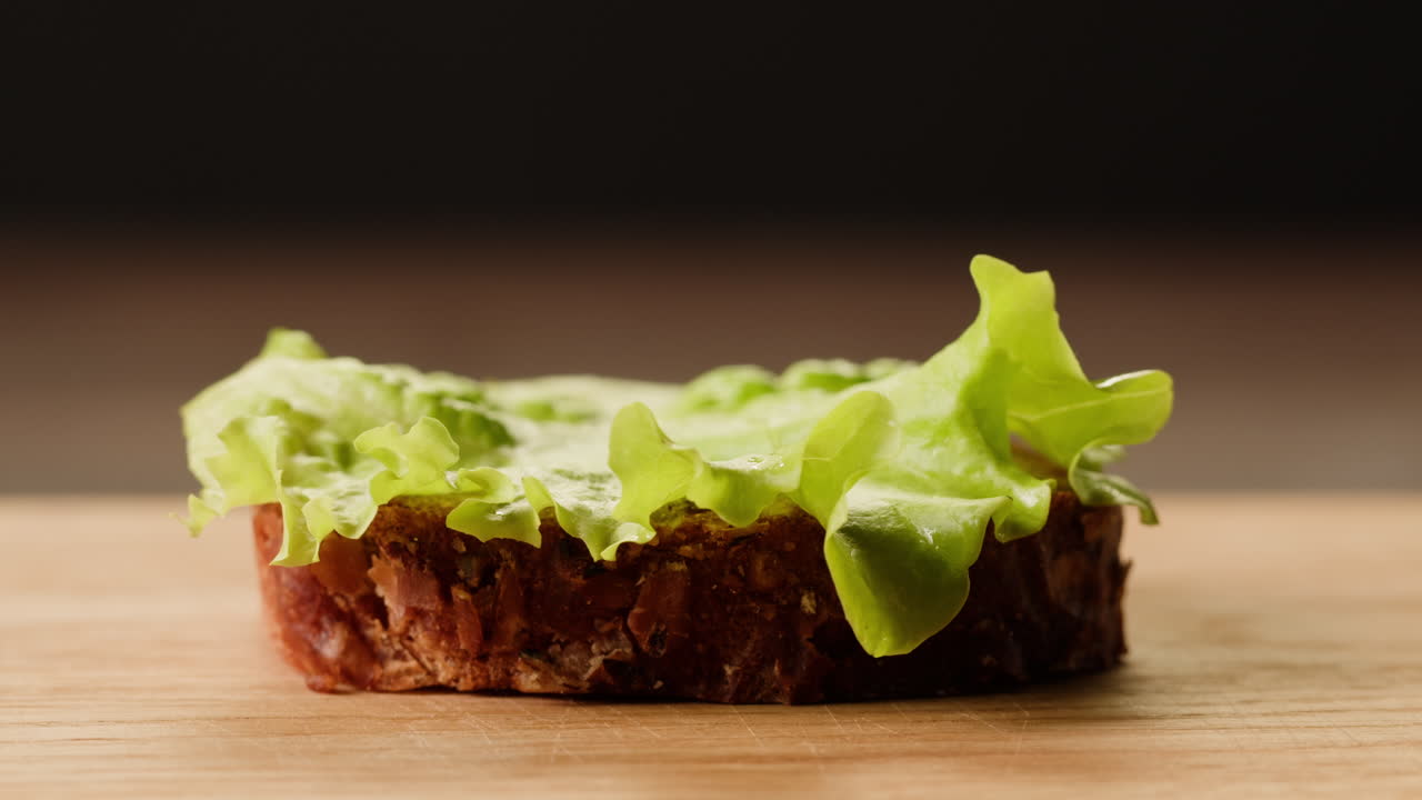Preparing a Ham and Lettuce Sandwich