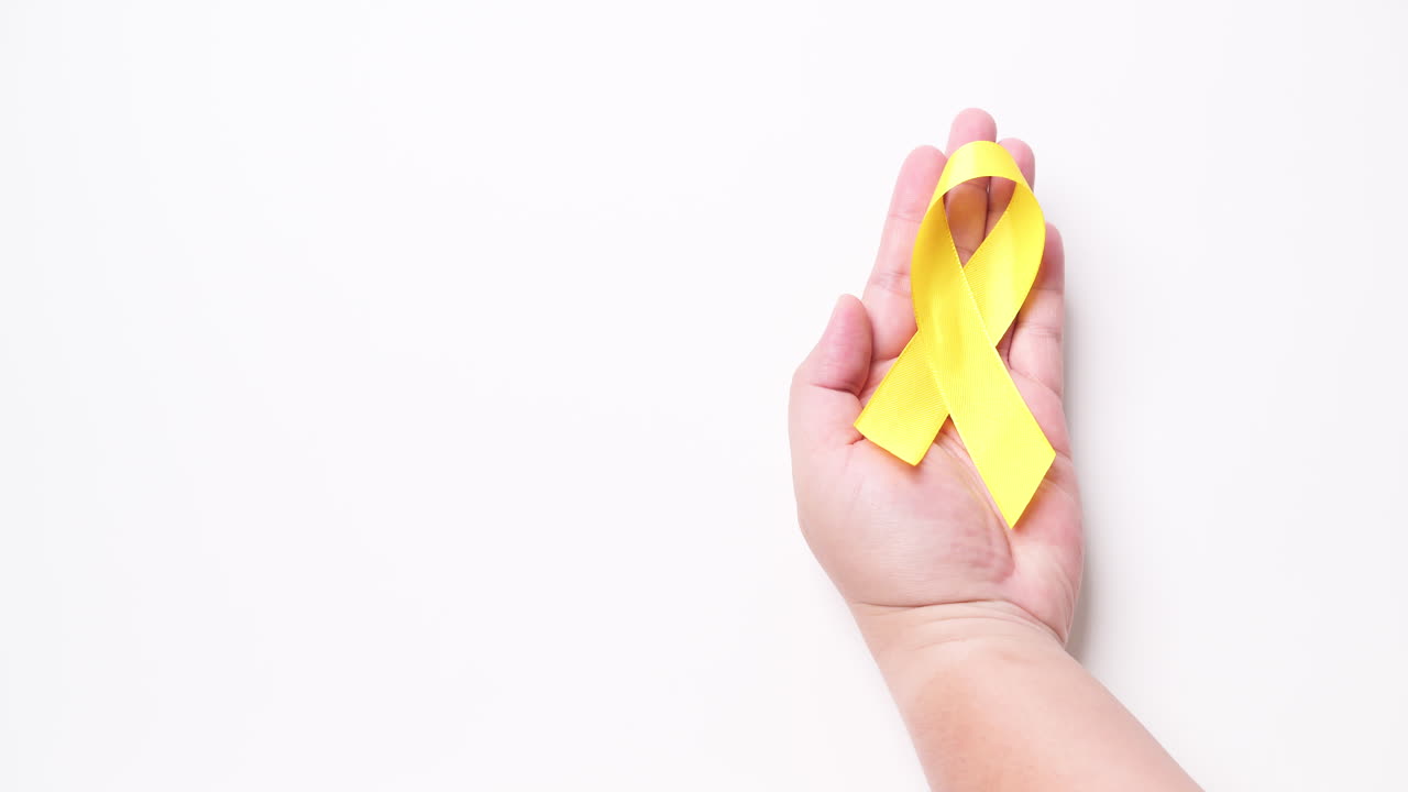 Giornata della prevenzione del suicidio, Mese della consapevolezza per l'infanzia, il sarcoma, il cancro alle ossa e alla vescica e Nastro Giallo a sostegno della vita e della malattia delle persone