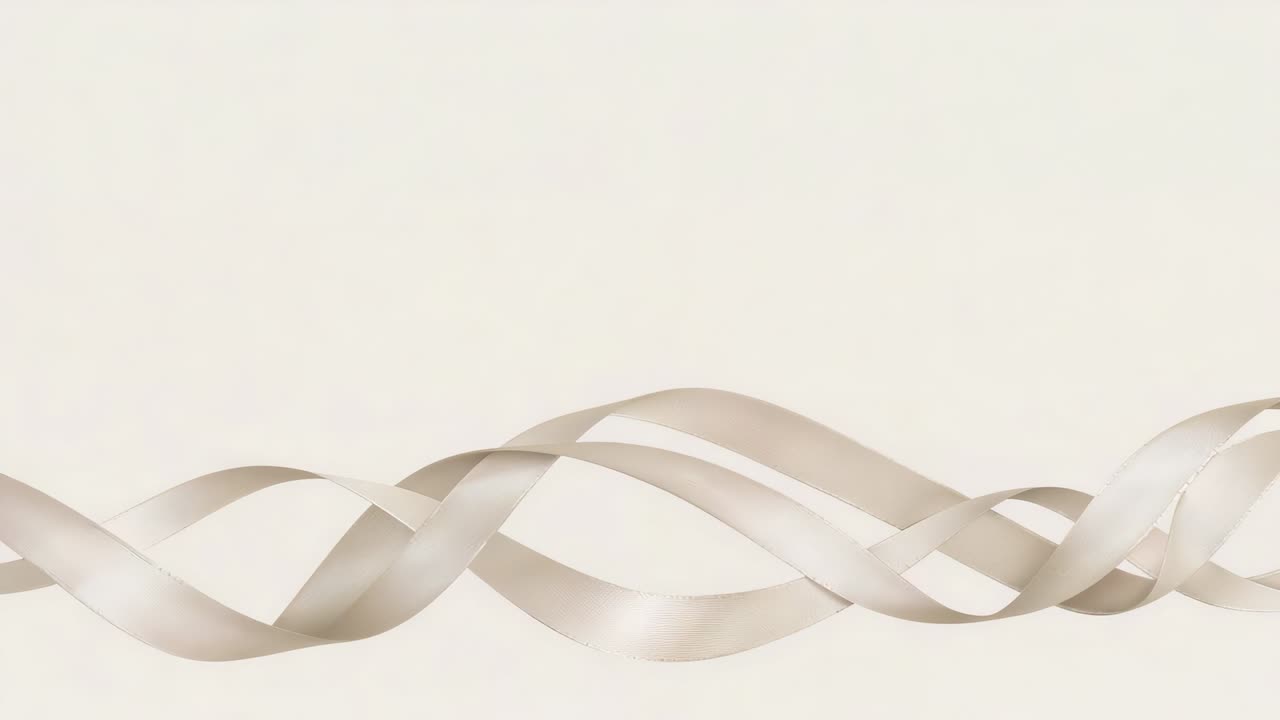 Playback starting, satin ribbons shifting and weaving across lower third of frame, forming pattern