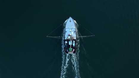 top down aerial of fishing boat in america