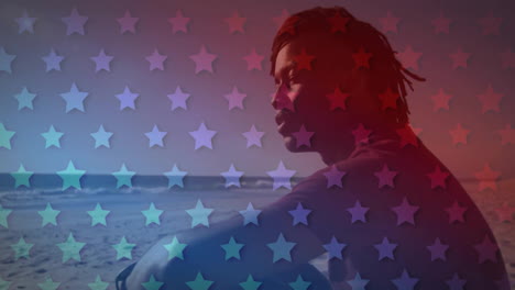 animation of blue and red stars over african american man on beach