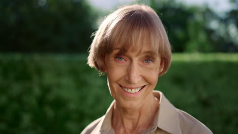 portrait of smiling senior woman looking at camera