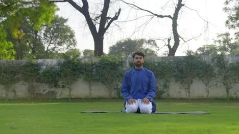 Indian-man-doing-thunderbolt-yoga-pose