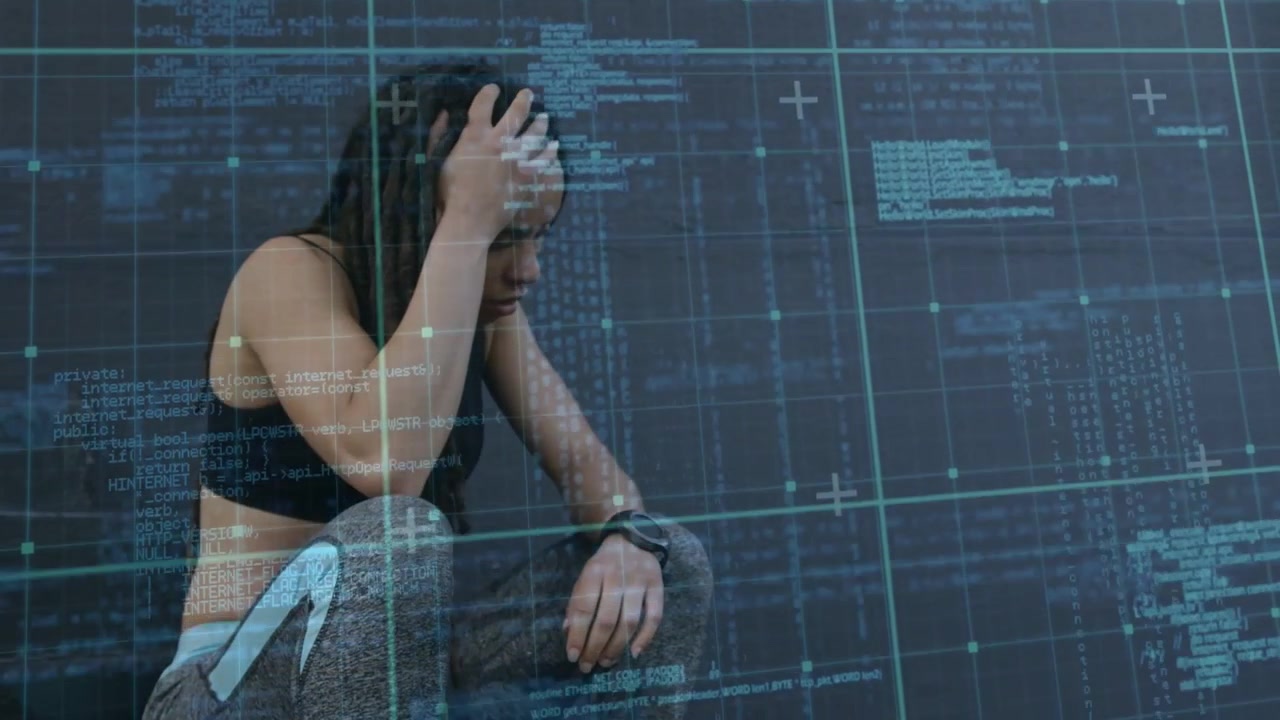 Fitness athlete checking smartwatch and activating teal HUD grid and code while massaging forehead