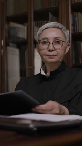 judge reviewing documents in a law office