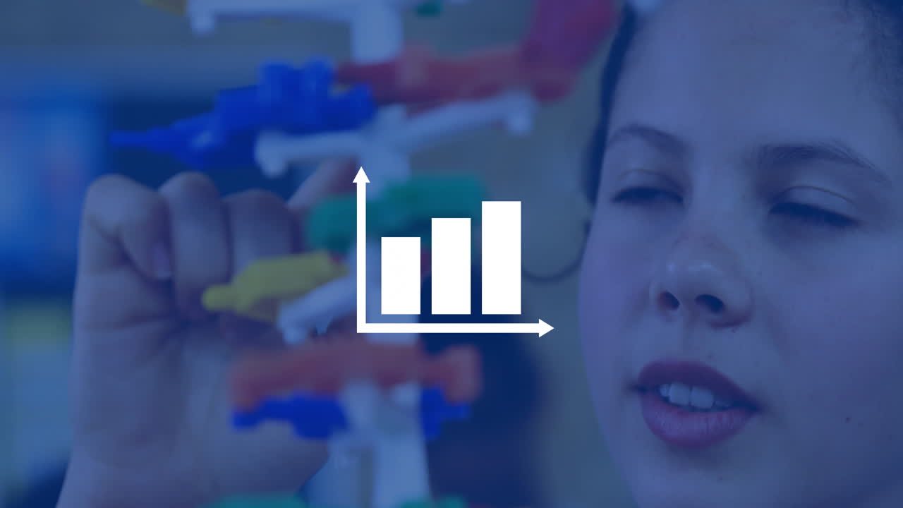 Young person interacting with colorful model, graph animation overlaying scene