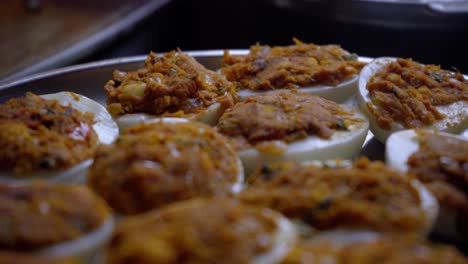 filling eggs stuffing boiled egg plate full of looking tasty extreme closeup deviled egg also known as stuffed eggs, russian eggs, or dressed eggs