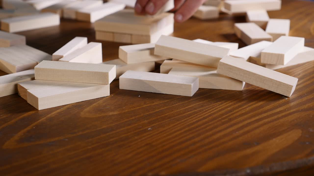 The wooden blocks on the table. .Jenga game. selective focus