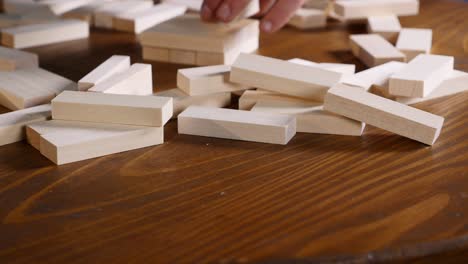 the wooden blocks on the table. .jenga game. selective focus