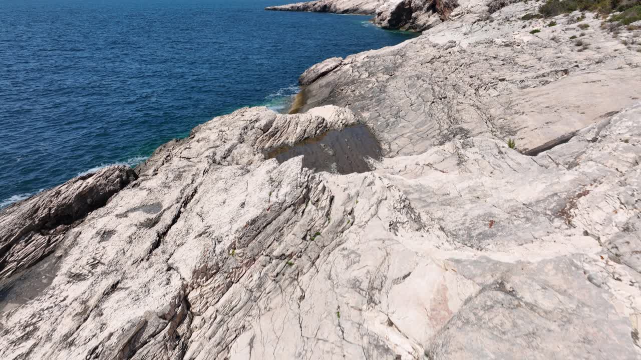 Rocky White Cliffs Overlooking Adriatic Sea From Shore Of Dugi Otok In Zadar, Croatia. drone tilt-up shot