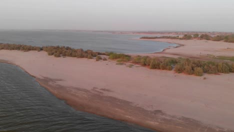 drone dolly over sand beach coastline in balochistan beside the arabian sea