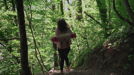 woman hiking in a forest