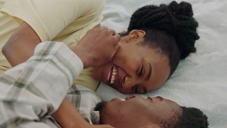 Excited,-kiss-and-couple-jump-on-a-bed