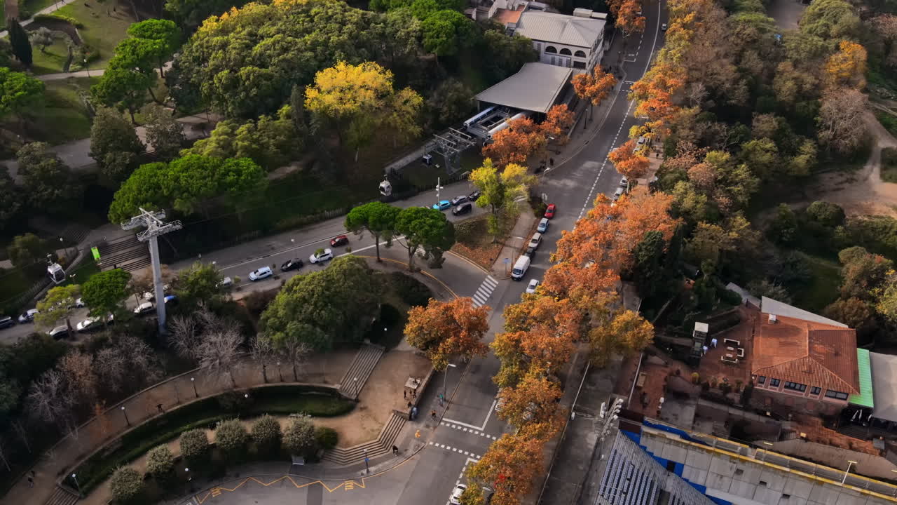 Aerial drone view of Montjuic hill streets in Barcelona. Sunny day. Spain