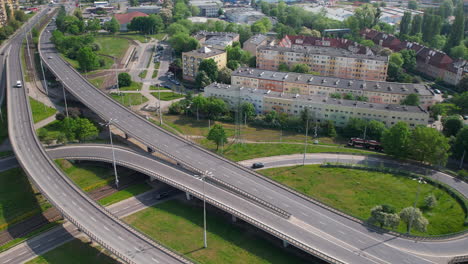 Drone-pullback-follows-winding-highway-through-european-road-system-on-ramp