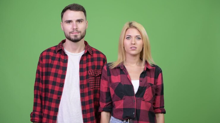 Young couple head nodding no together