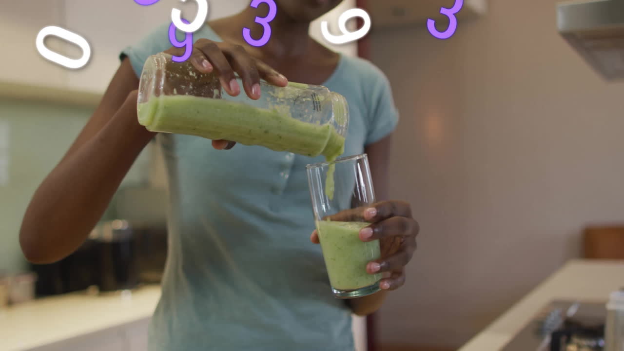 Pouring green smoothie into glass, person surrounded by floating numbers animation