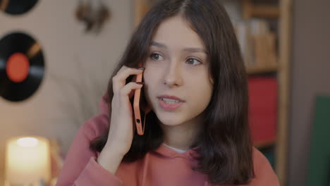 teenage girl talking on phone