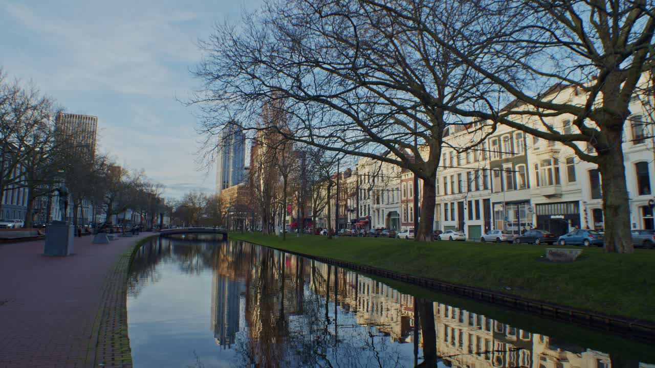 european dutch style traditional park with water canal, architecture in wide angle scenery landscape of street view