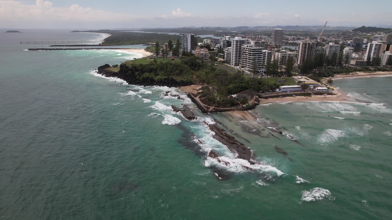 Waves Crashing Against The Rainbow Bay, Snapper Rocks,Froggy Beach In Coolangatta, Queensland, Australia. - aerial shot
