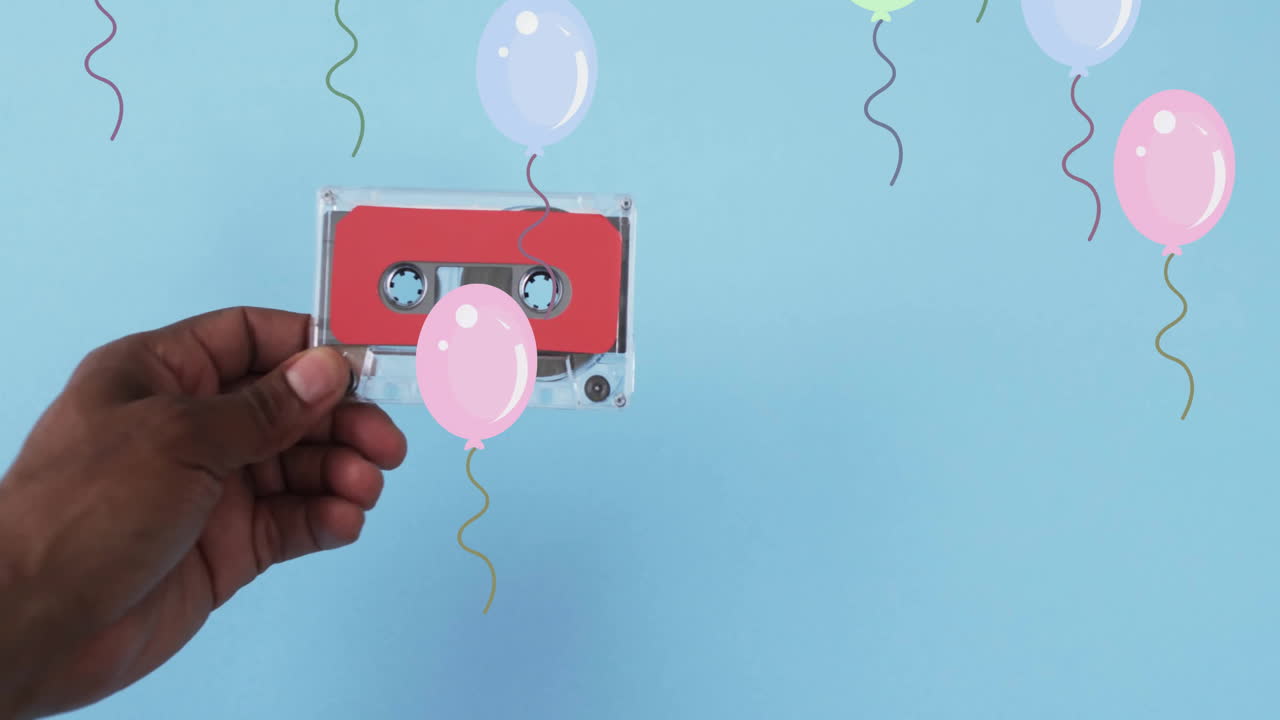 Animazione di palloncini e una mano che tiene del nastro adesivo su sfondo blu