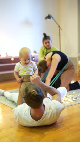 family yoga and fitness class with baby