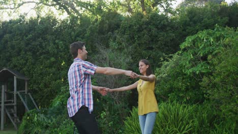 happy caucasian couple in garden