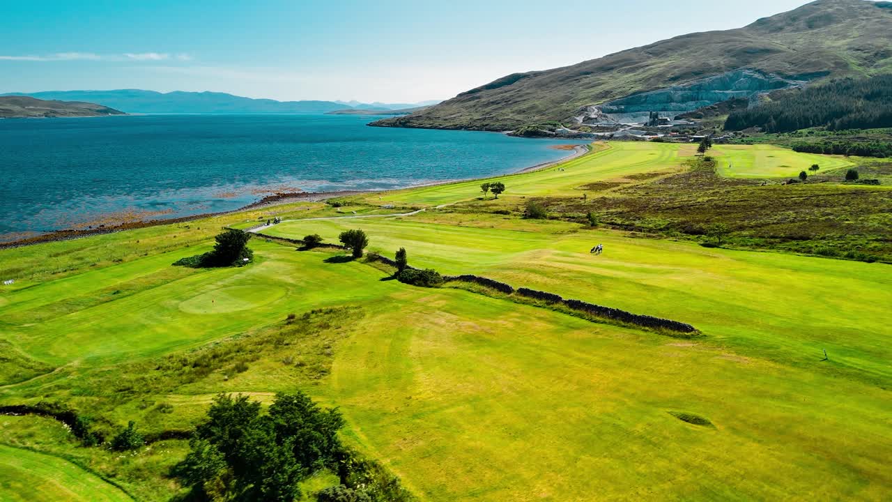 Scenic Golf Course Landscape with Sea and Mountains