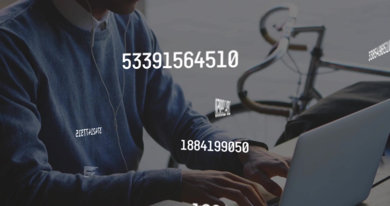 Man focusing on laptop and coding data analysis code swirling numeric streams appearing then fading