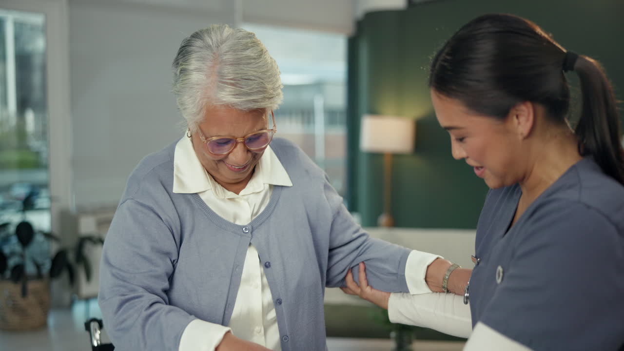 Senior woman with caregiver at home