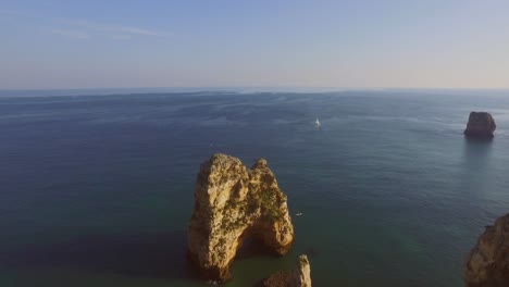 the famous cliffs and caves of farol da ponta da piedade in lagos, portugal