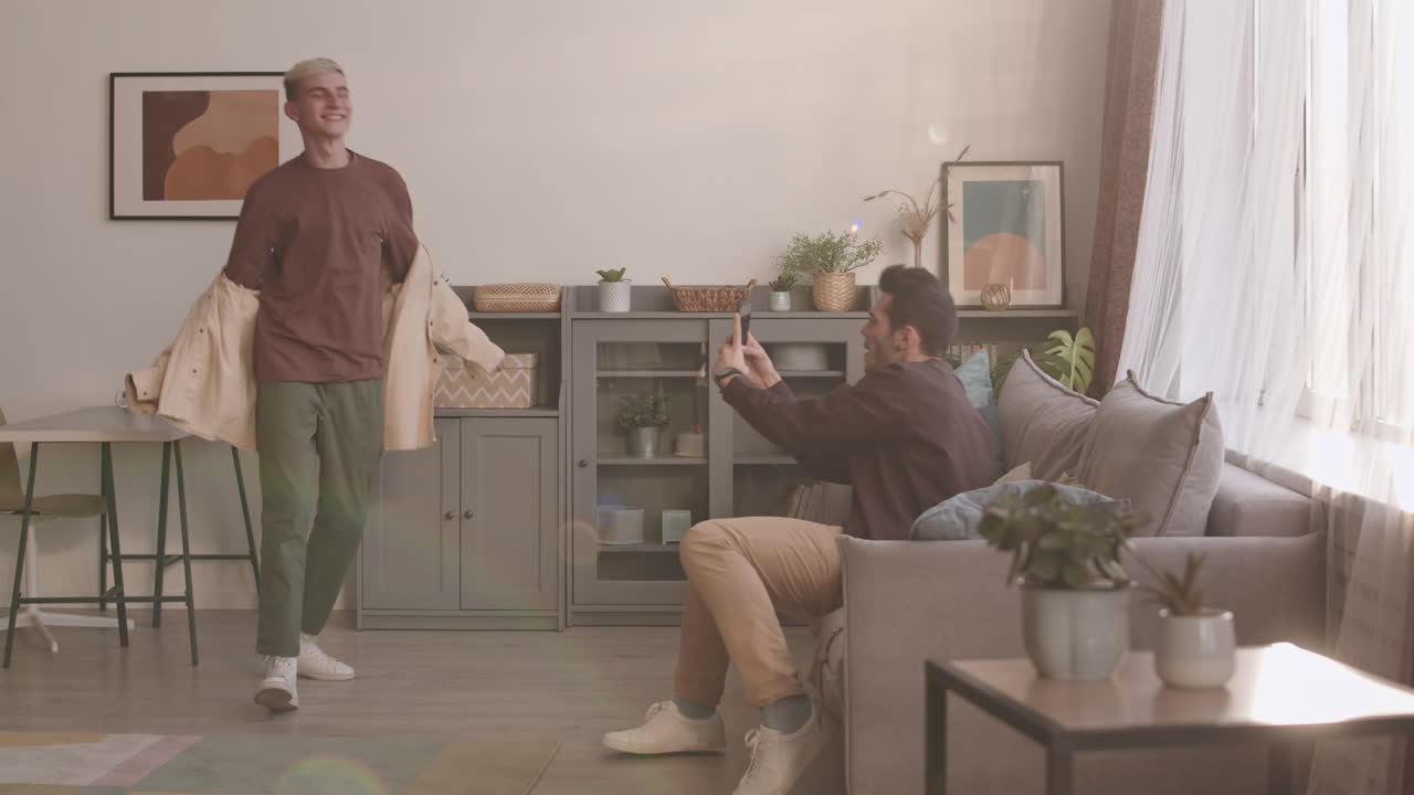 Young Man Shooting on Phone His Boyfriend Singing