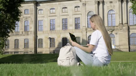 female college student sitting on the grass in a p 4k 2025 08 04 08 27 22 utc.mov | academic, adult, american, beautiful