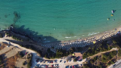 tourists on the beach enjoy their summer vacation
