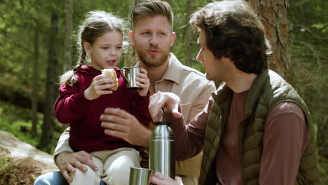 Family-having-picnic-at-the-forest