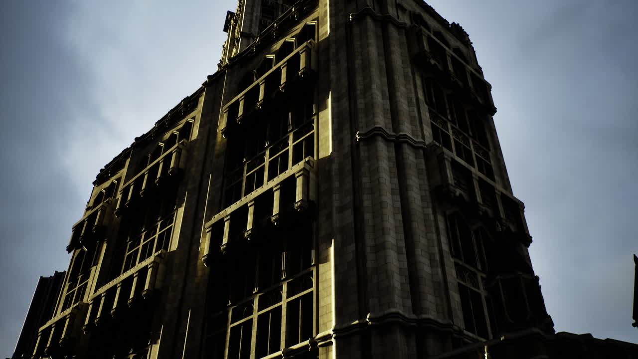 Historic building against dramatic sky during twilight hours in urban area