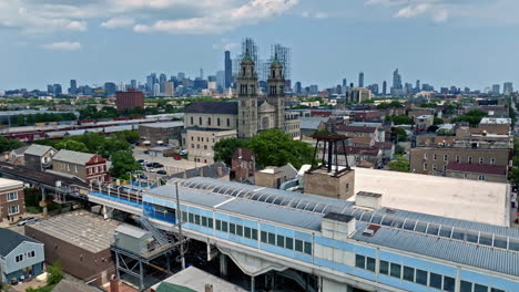 Aerial-view-of-the-18th-station-and-the-St-Adalbert-Church,-summer-day-in-Pilsen,-Chicago