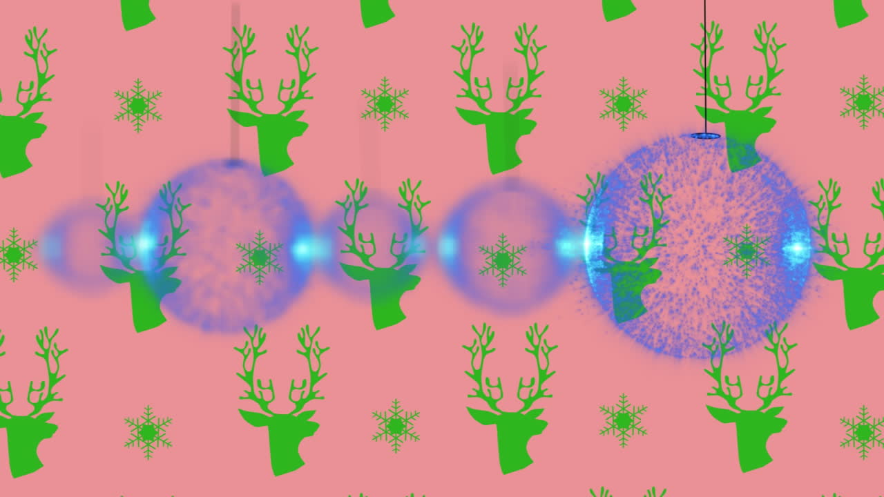 animación de bolas de navidad sobre el patrón de renos sobre un fondo rosa