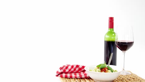 Red-wine-with-bowl-of-pasta