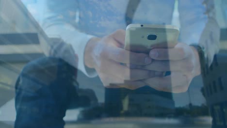 animation of man using smartphone over cityscape