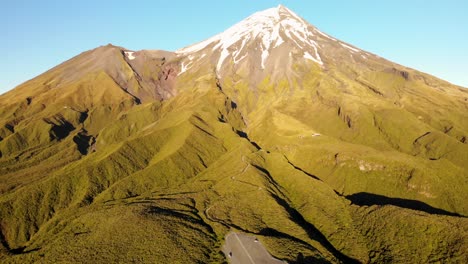 Spectacular-volcano-Taranaki-aerial-shot-during-golden-hour