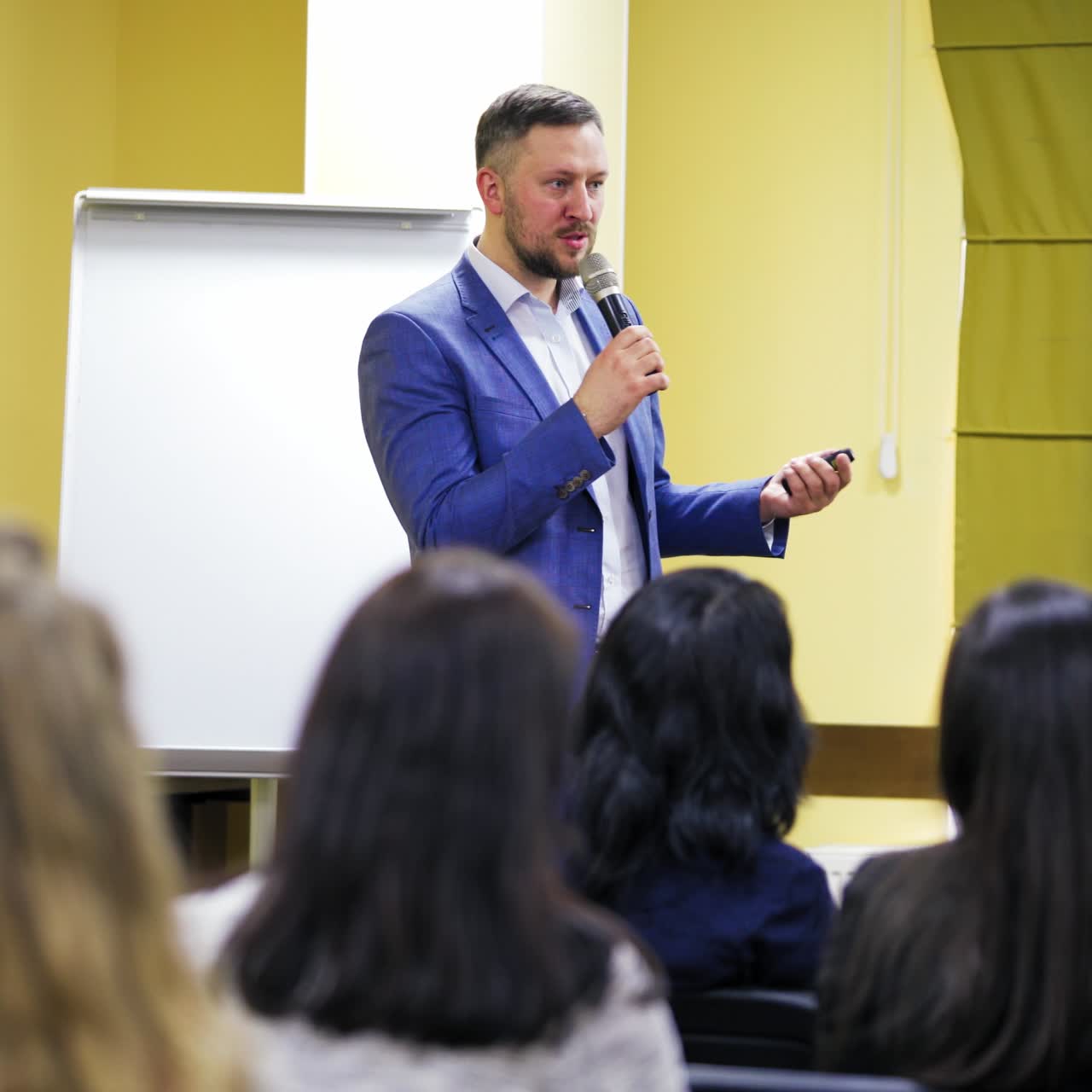 Talk in conference hall