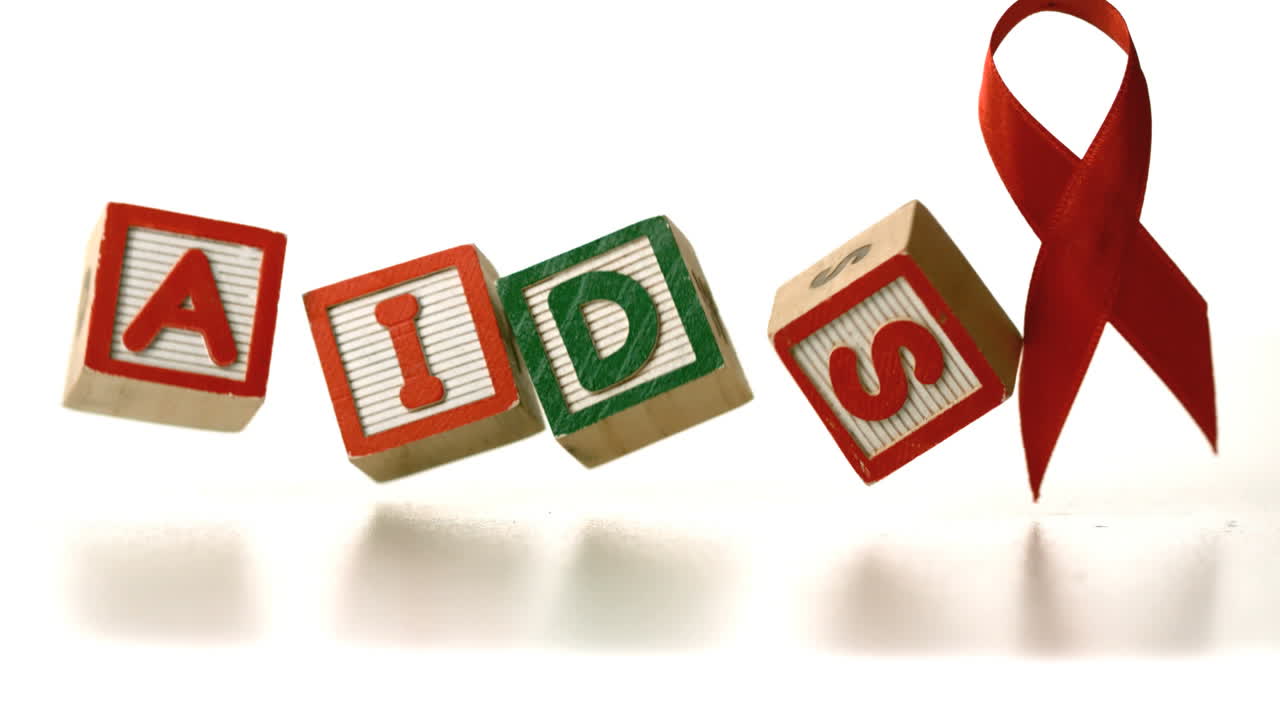 빨간 리본 앞 에 철자 도구 가 떨어지는 블록