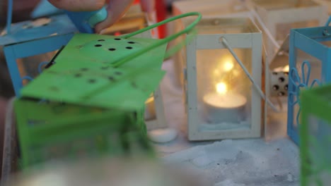 Lighting-candles-in-street-lanterns