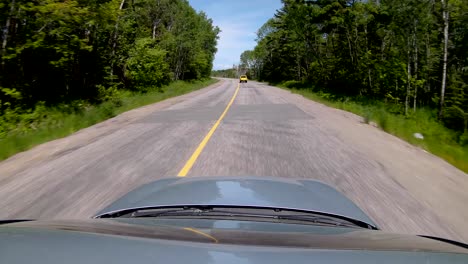 Driving-Behind-a-Yellow-Pickup-Truck-On-Back-Road,-Wide-Sunroof-POV-in-4K-60fps