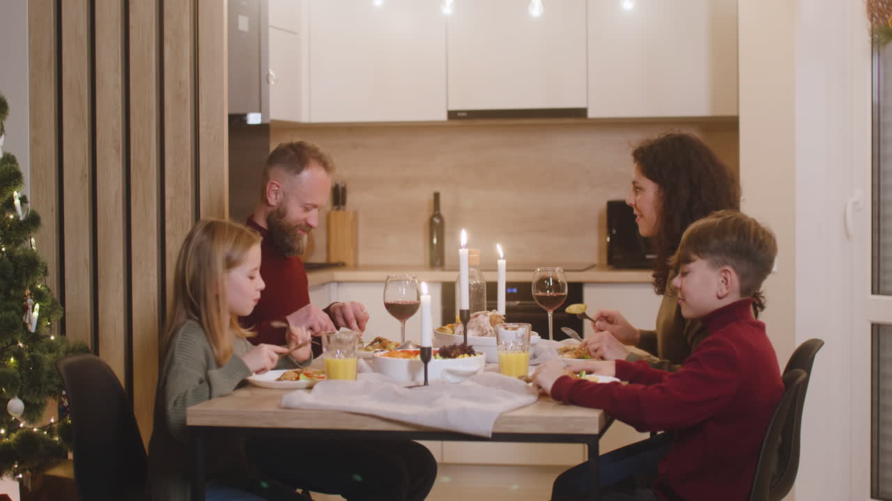 Close Up Of Happy Friends Toasting And Drinking Champagne At New Year's Eve Party