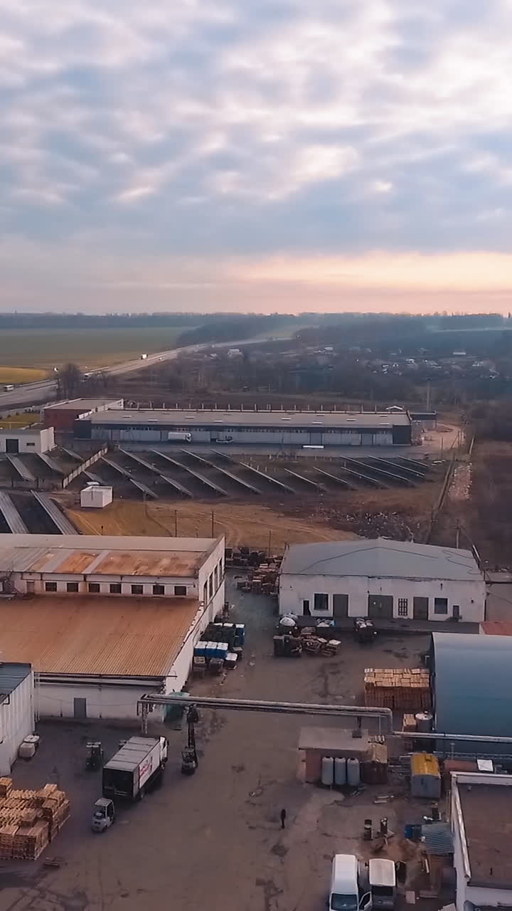 Solar energy farm. Aerial view of factory roof with solar panels
