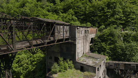 desolate rusty platform and building of abandoned factory in chiatura