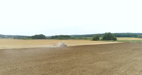 Agriculture-Tractor-Plowing-Field-4K-1